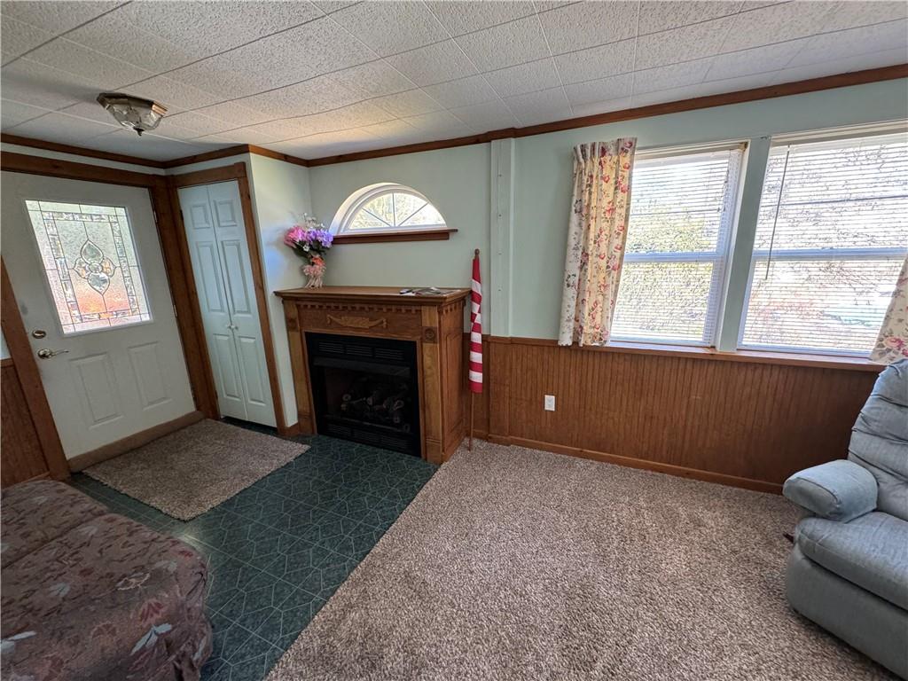 2494 Spaulding Road Clymer, PA 15728 - Photo 6 of 17 a living room with furniture and a fireplace