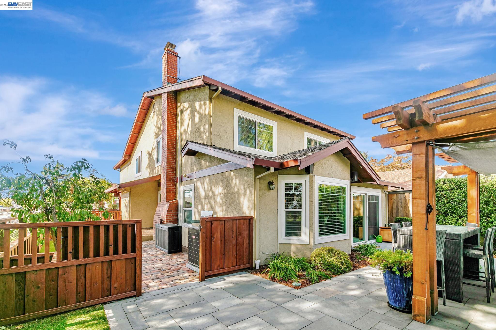5136 Ramsgate Drive Newark, CA 94560 - Photo 11 of 59 a front view of a house with garden