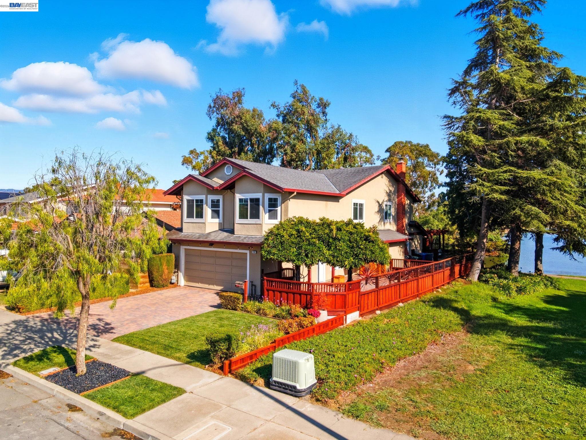 5136 Ramsgate Drive Newark, CA 94560 - Photo 14 of 59 a front view of a house with a yard