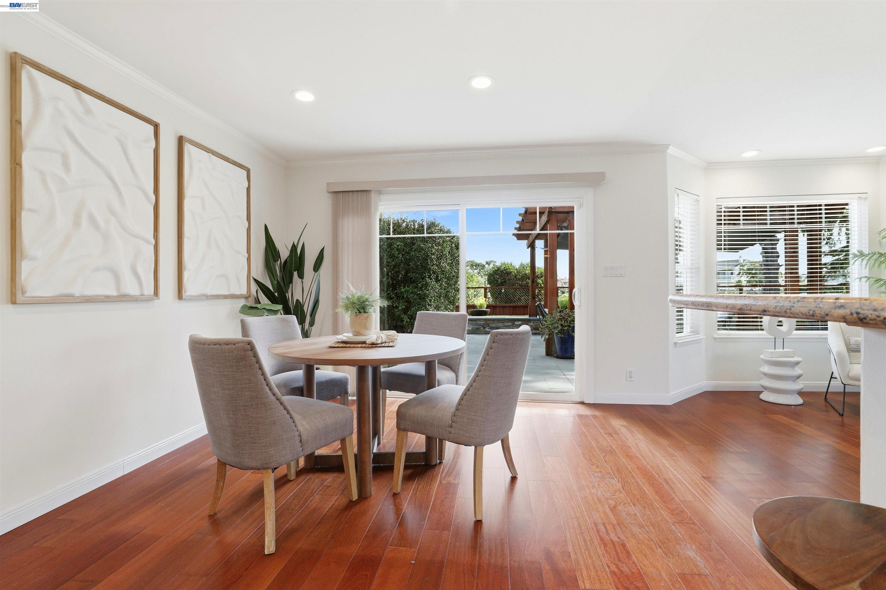 5136 Ramsgate Drive Newark, CA 94560 - Photo 17 of 59 a dining room with furniture and wooden floor