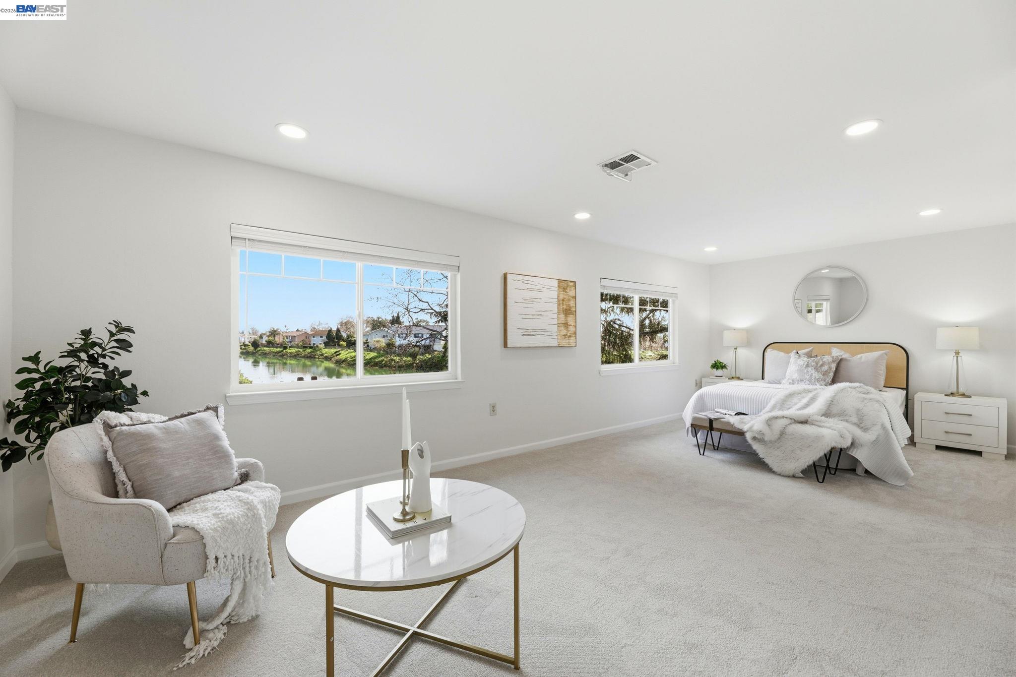 5136 Ramsgate Drive Newark, CA 94560 - Photo 19 of 59 a living room with furniture and a potted plant