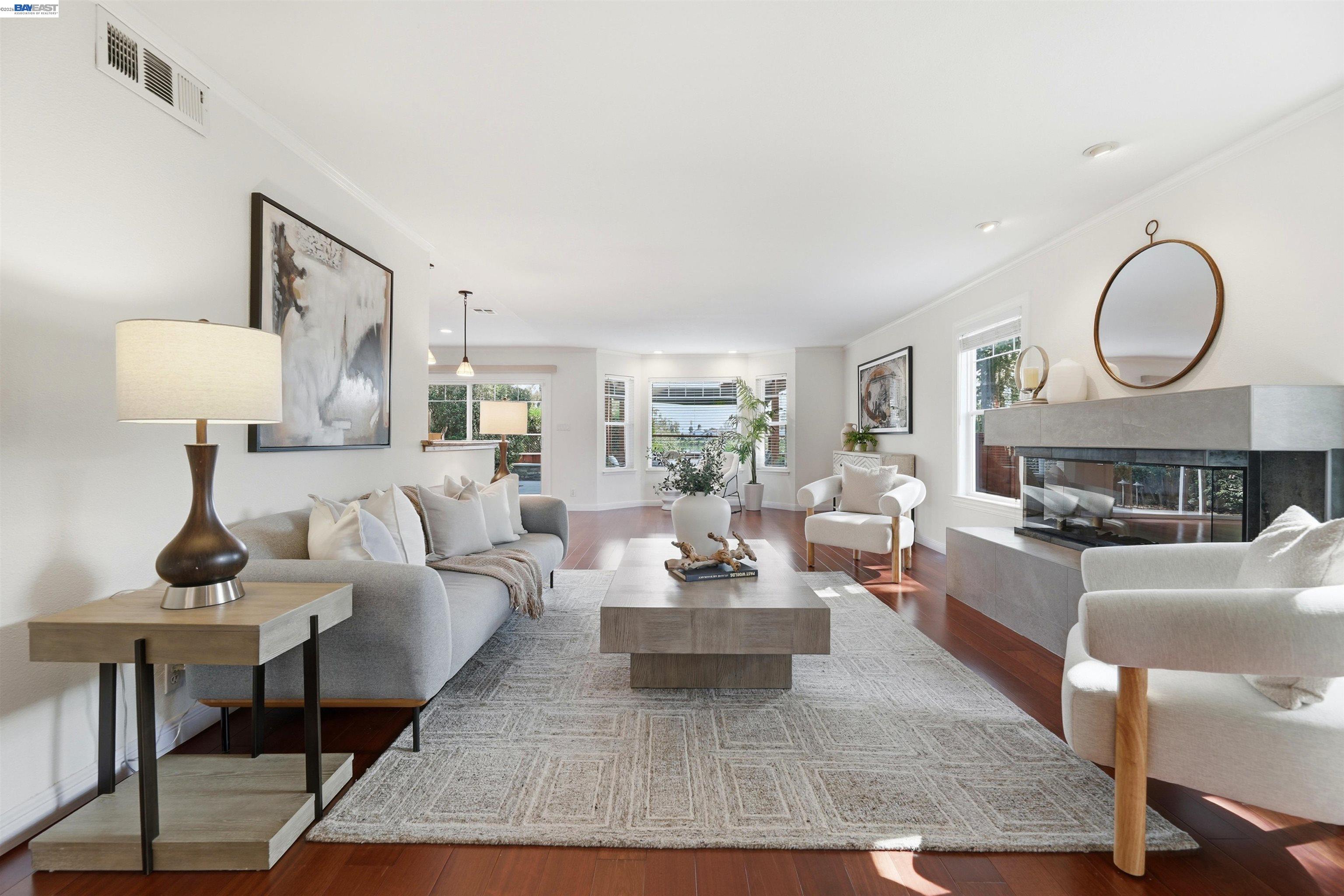 5136 Ramsgate Drive Newark, CA 94560 - Photo 24 of 59 a living room with furniture a lamp on wall and a window