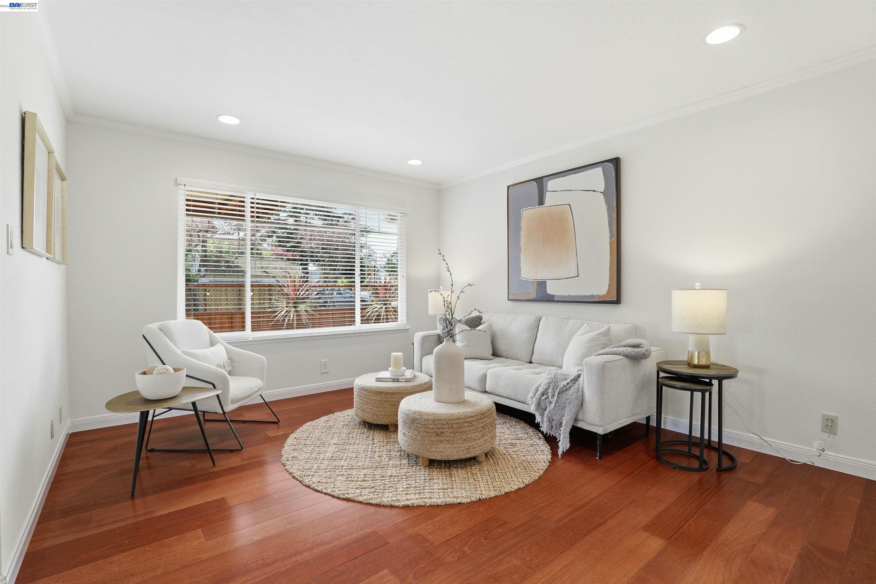 5136 Ramsgate Drive Newark, CA 94560 - Photo 26 of 59 a living room with furniture and a potted plant