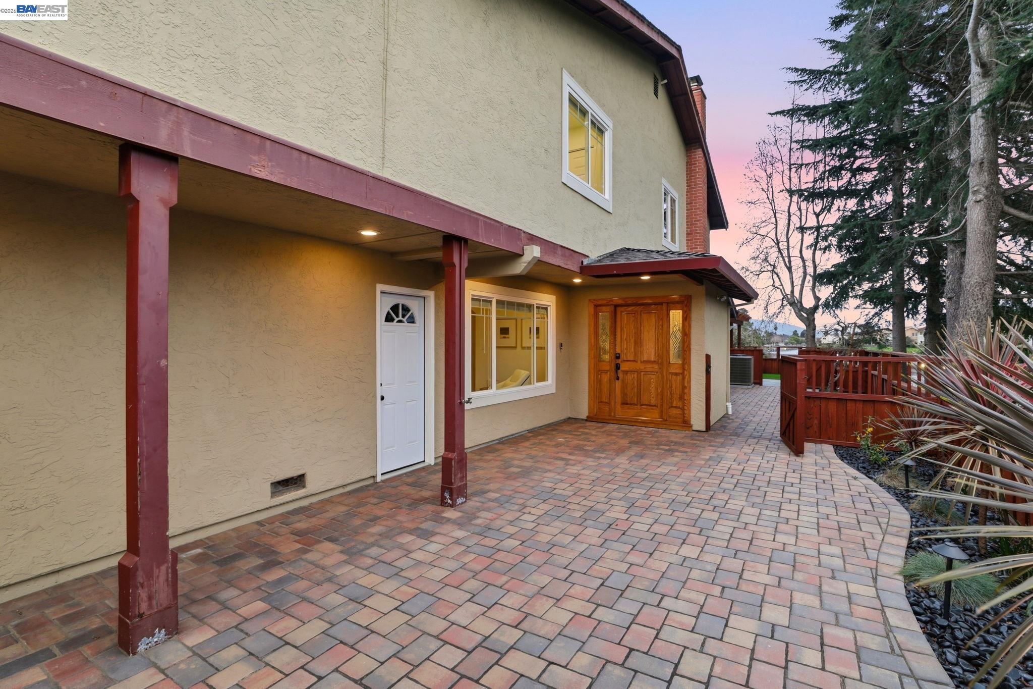 5136 Ramsgate Drive Newark, CA 94560 - Photo 52 of 59 a view of a house with a large window and wooden fence