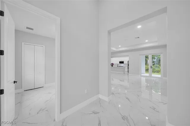 a view of a hallway with closet