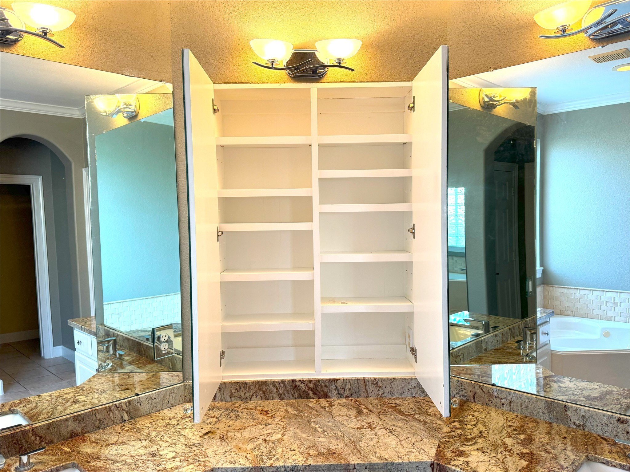 12442 Lago Bend Lane Houston, TX 77041 - Photo 17 of 31 a view of a bedroom with a wooden door
