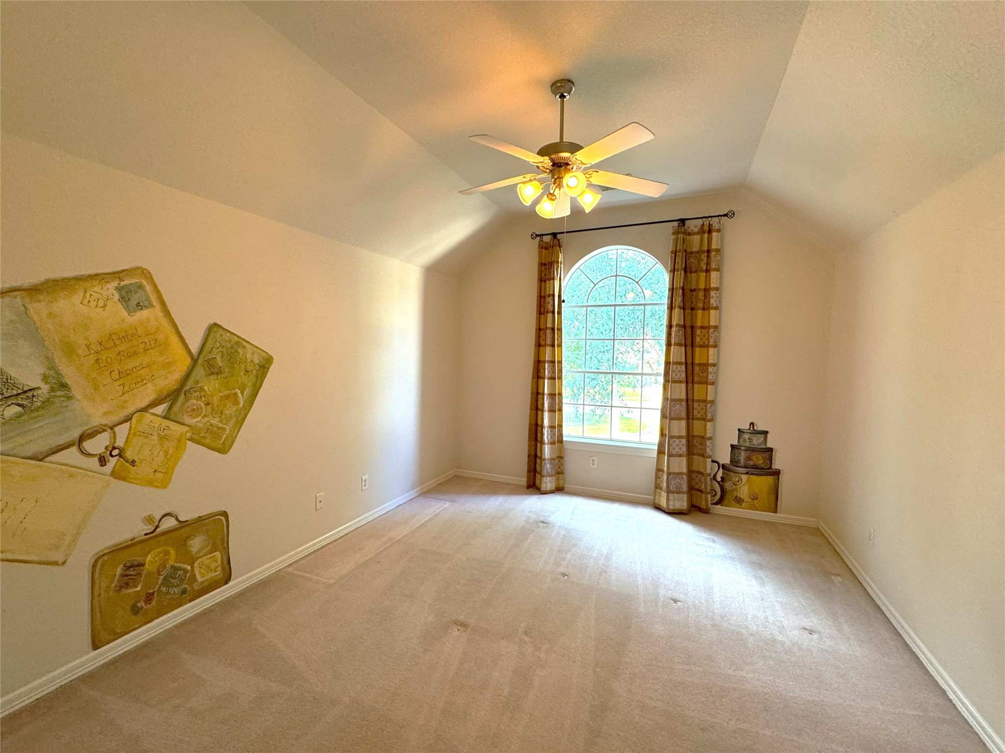 12442 Lago Bend Lane Houston, TX 77041 - Photo 23 of 31 a bedroom with a bed and a chandelier