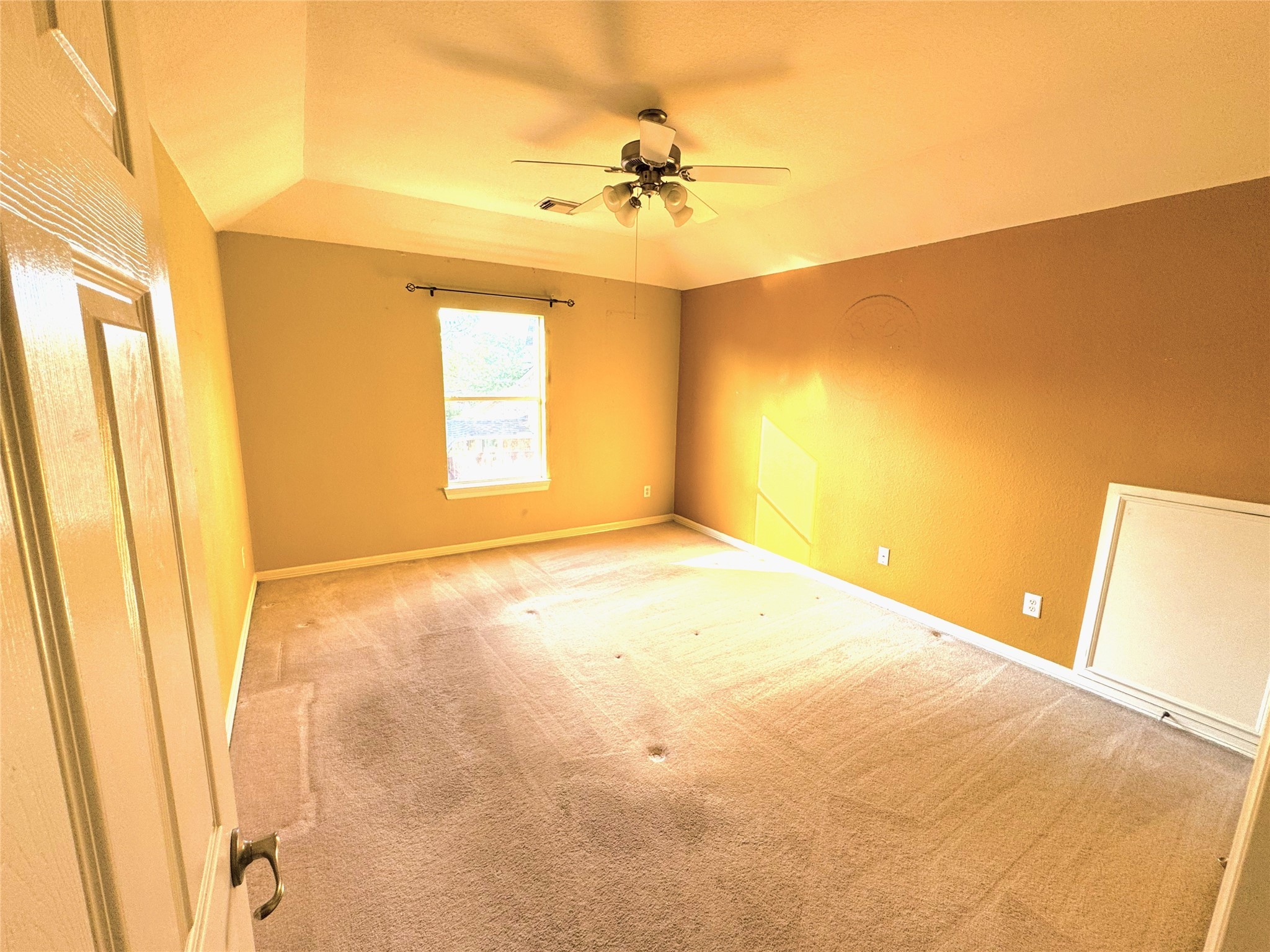 12442 Lago Bend Lane Houston, TX 77041 - Photo 25 of 31 a view of a room with a window and a ceiling fan