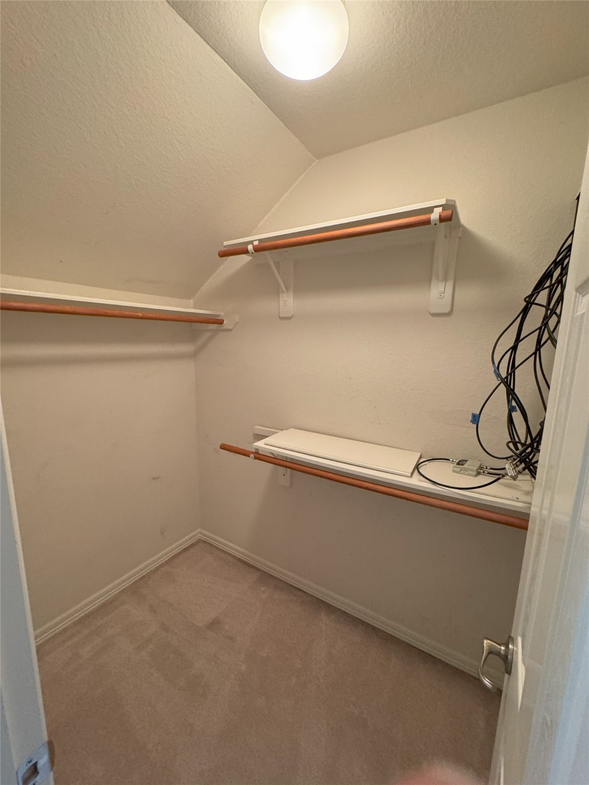 12442 Lago Bend Lane Houston, TX 77041 - Photo 27 of 31 a view of an empty walk in closet