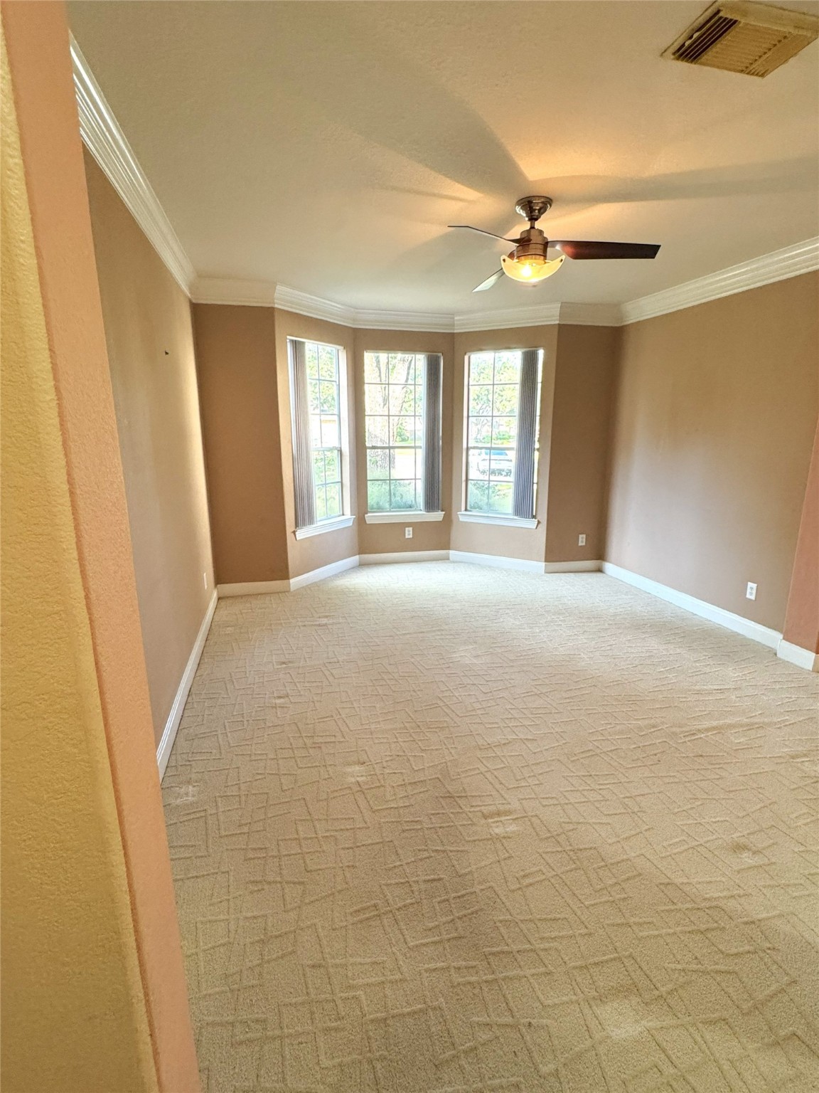 12442 Lago Bend Lane Houston, TX 77041 - Photo 4 of 31 a view of an empty room with a window