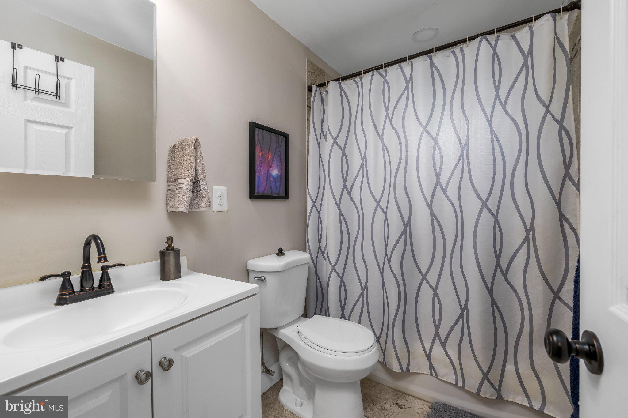 3240 Leverton Avenue Baltimore, MD 21224 - Photo 13 of 22 Modern bathroom with elegant accents.