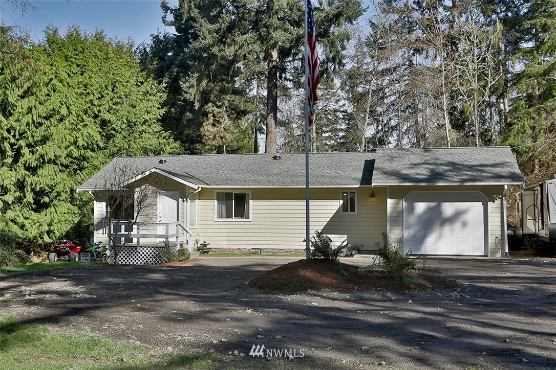 3336 East Harbor Road Langley, WA 98260 - Photo 3 of 29 a view of a house with a yard