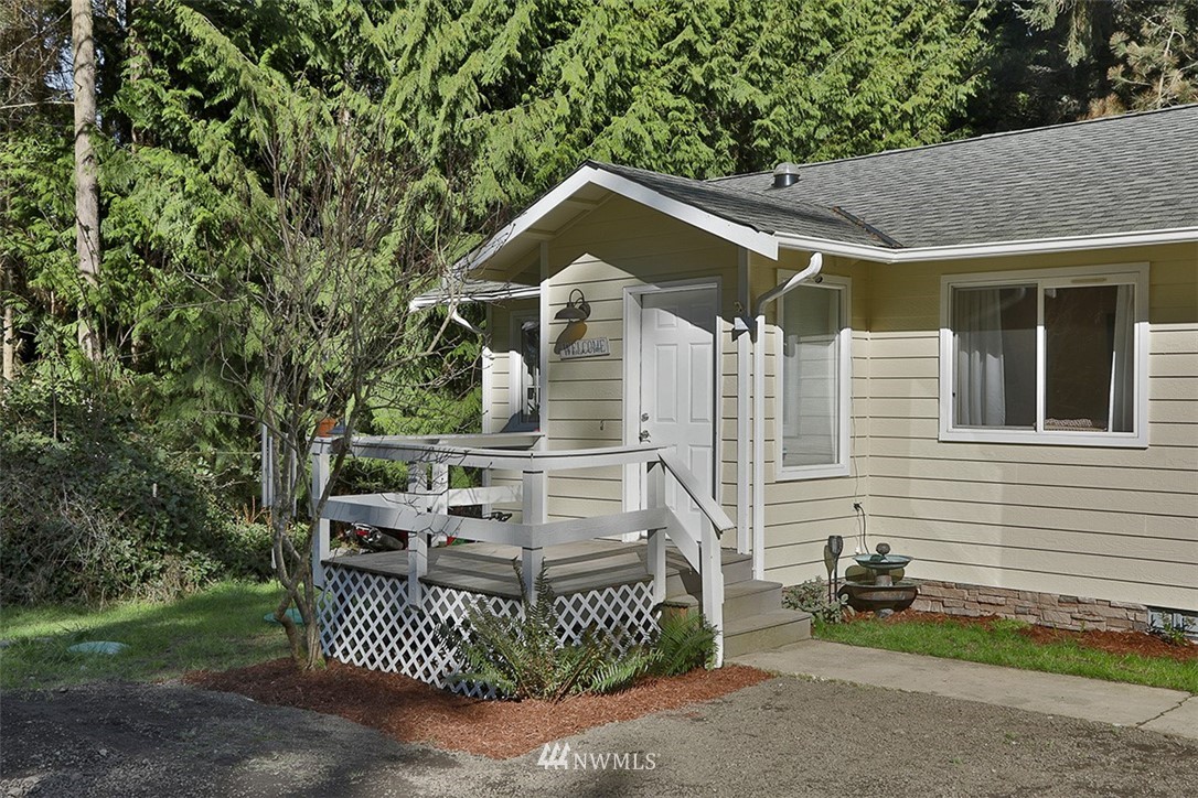 3336 East Harbor Road Langley, WA 98260 - Photo 4 of 29 a view of a house with a yard