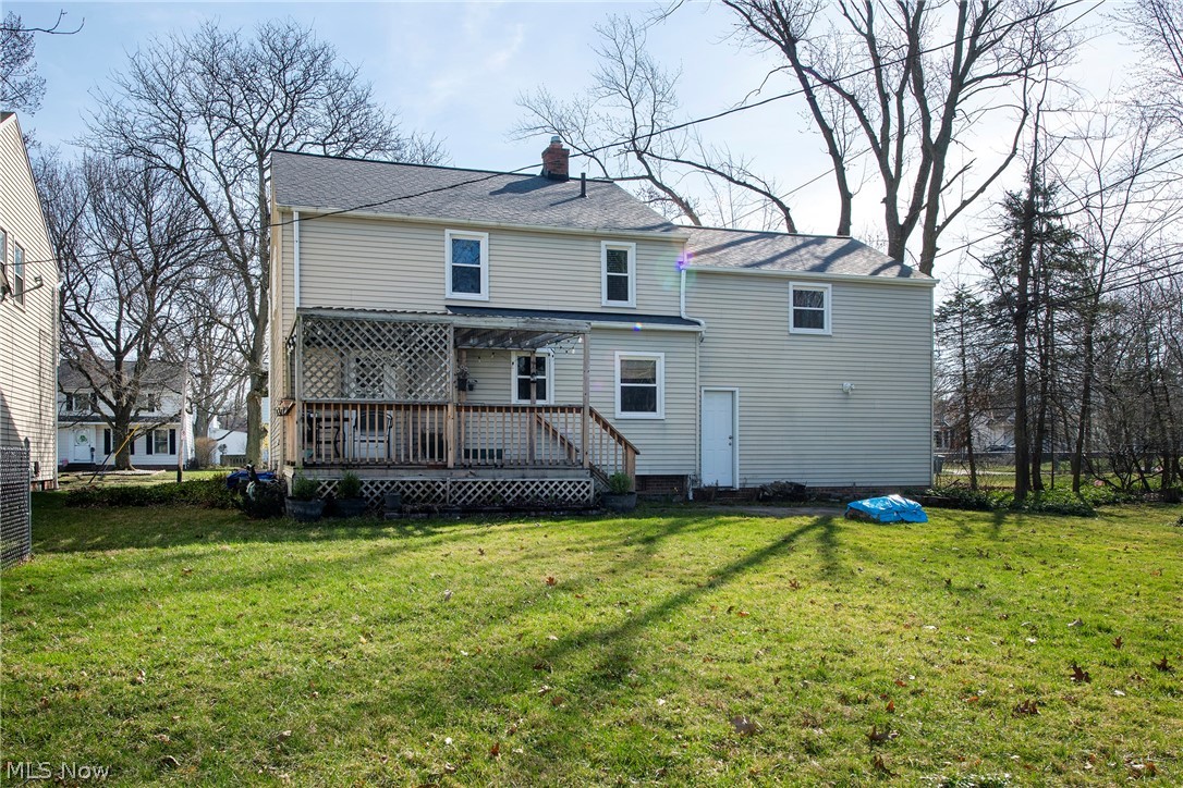 1170 Roland Road Lyndhurst, OH 44124 - Photo 28 of 36 Rear view of property featuring a wooden deck and a yard