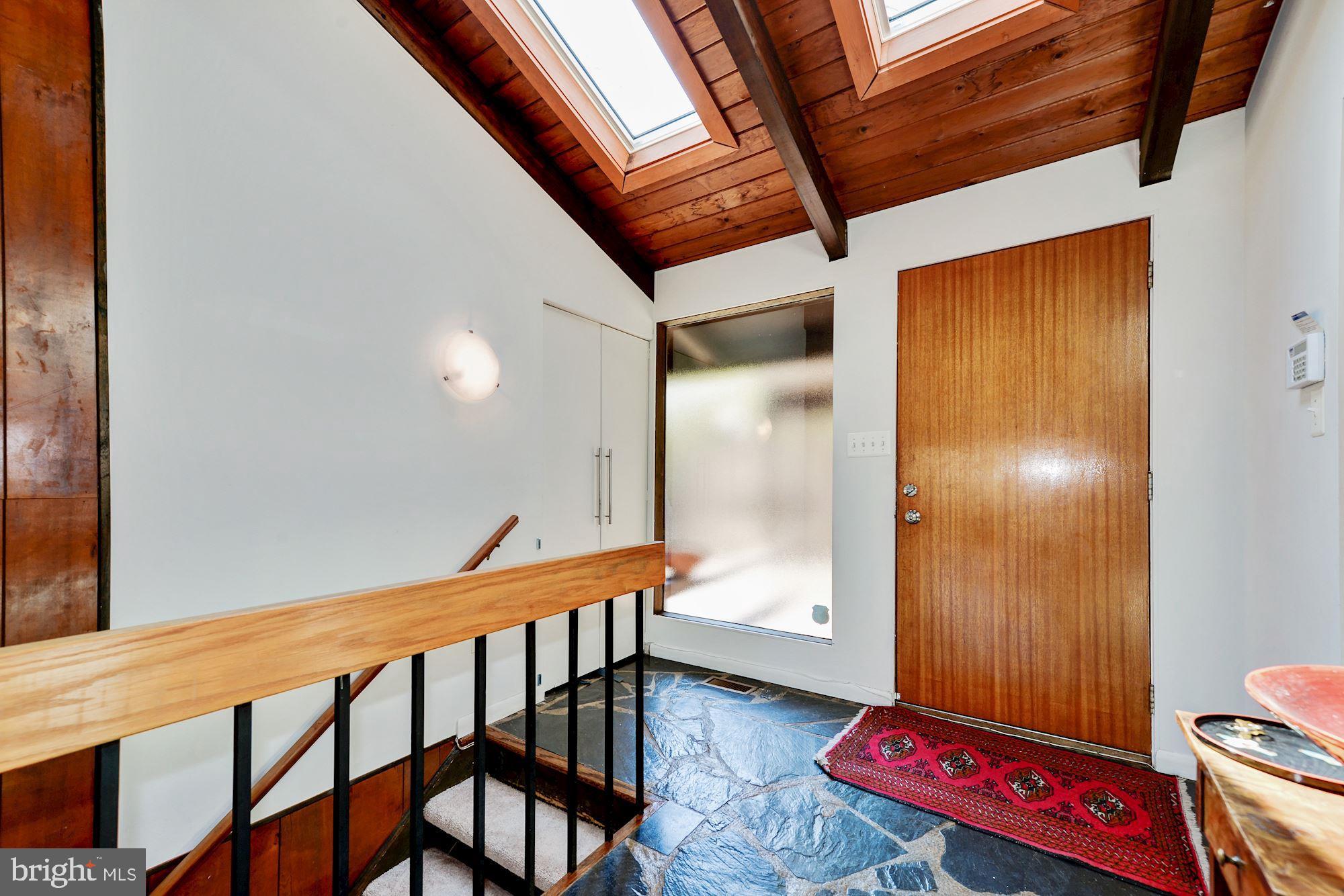 981 Saigon Road McLean, VA 22102 - Photo 5 of 46 Bright and open foyer with skylights