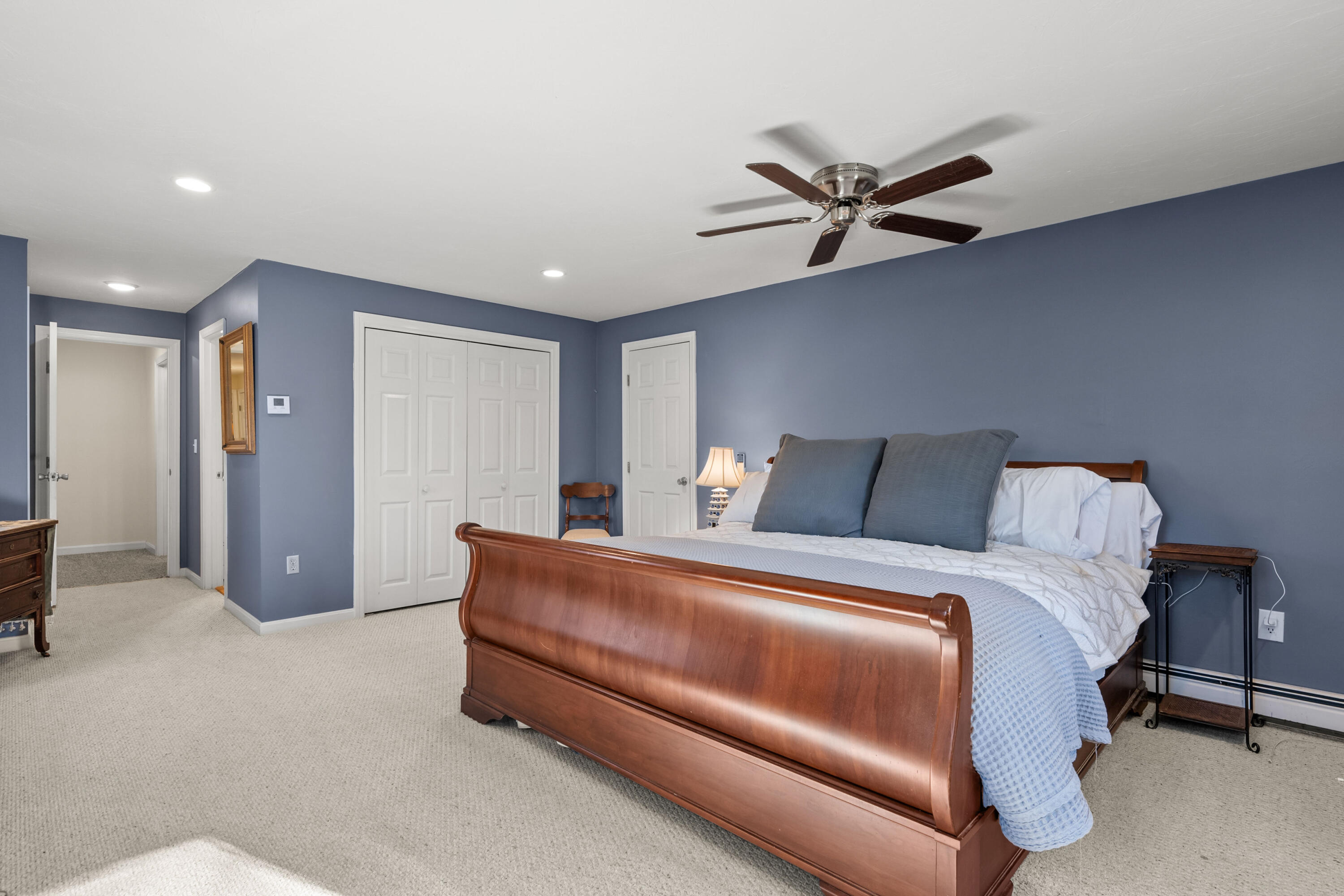 56 Allan Road West Barnstable, MA 02668 - Photo 15 of 21 a bed room with a bed and a ceiling fan