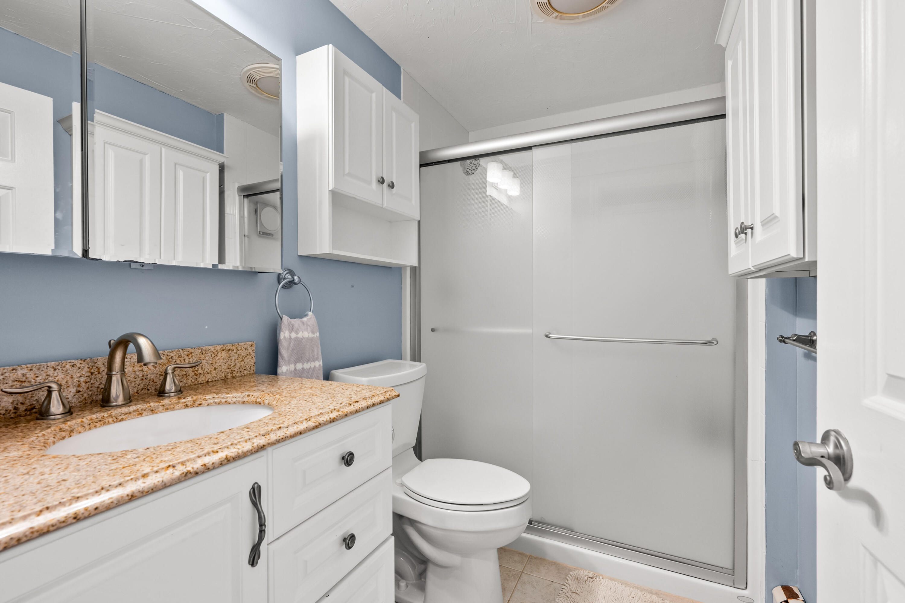 56 Allan Road West Barnstable, MA 02668 - Photo 16 of 21 a bathroom with a granite countertop sink toilet and shower