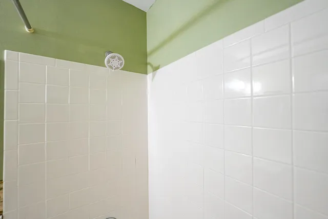 an aerial view of a pool patio yard and outdoor seating