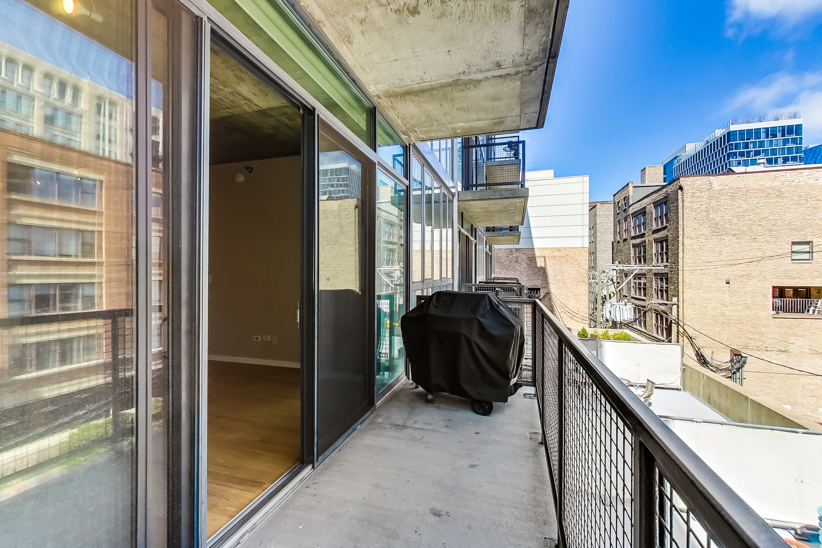 321 South Sangamon Street, Unit 408 Chicago, IL 60607 - Photo 27 of 31 a view of balcony with furniture