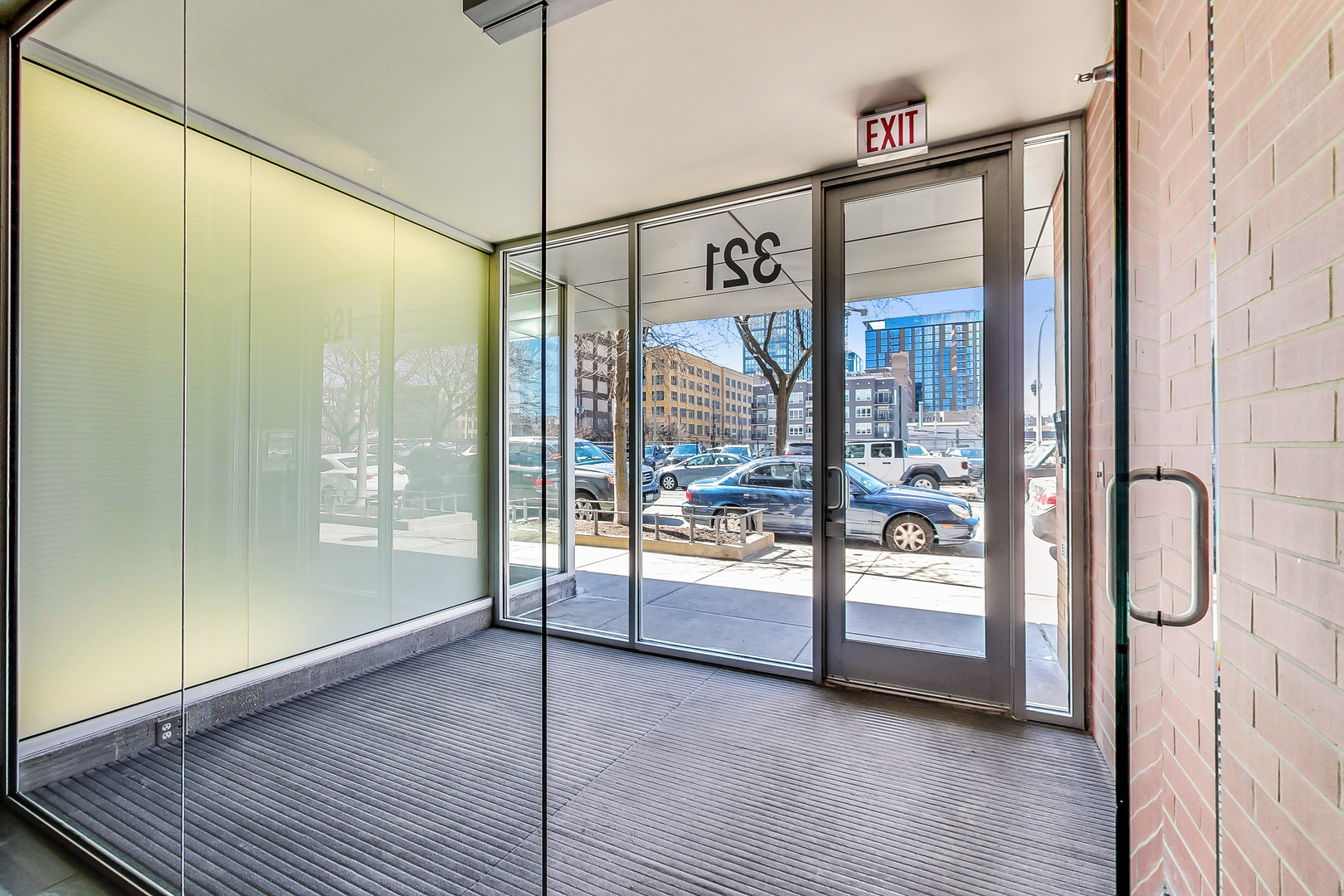 321 South Sangamon Street, Unit 408 Chicago, IL 60607 - Photo 3 of 31 a bathroom with a glass shower door