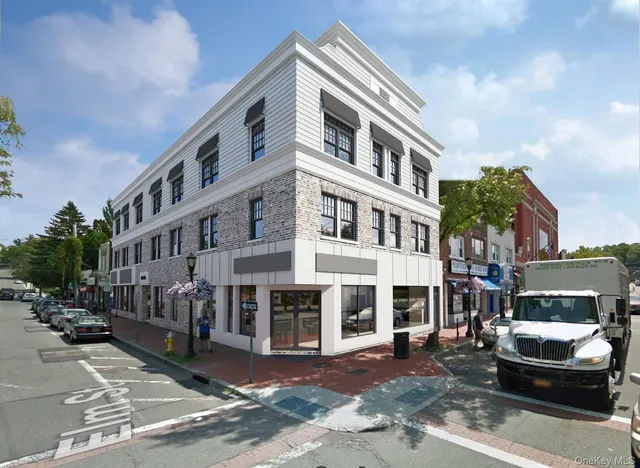 a front view of a building with street view