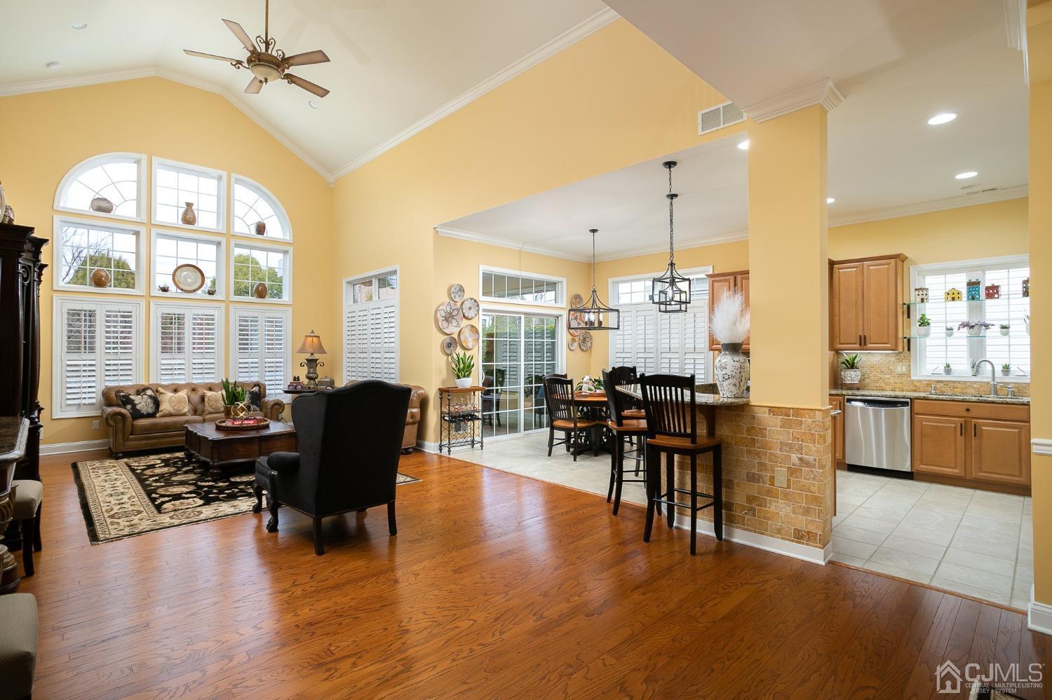 93 Timber Hill Drive Monroe Township, NJ 08831 - Photo 15 of 40 a living room with fireplace furniture and a large window