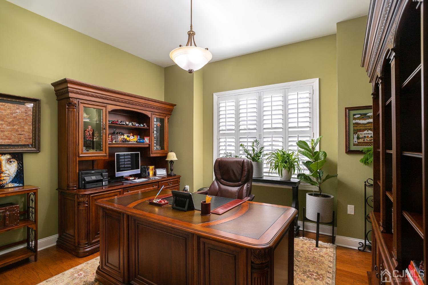 93 Timber Hill Drive Monroe Township, NJ 08831 - Photo 16 of 40 a view of a workspace with furniture and a window
