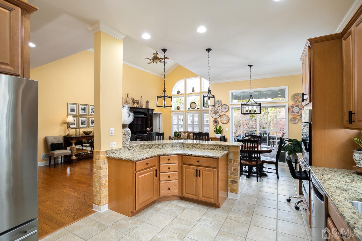 93 Timber Hill Drive Monroe Township, NJ 08831 - Photo 2 of 40 a large kitchen with a large counter top appliances and cabinets