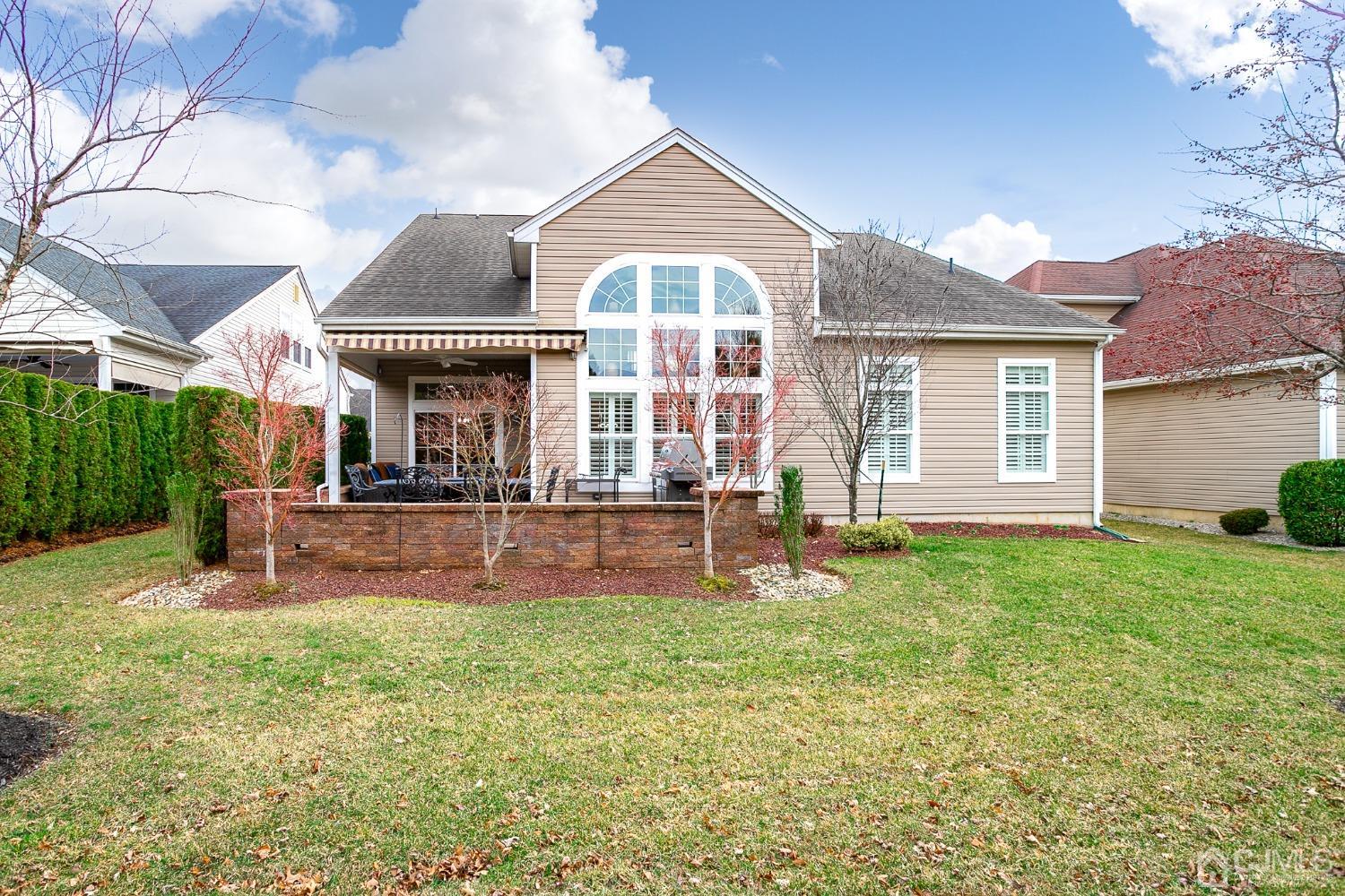 93 Timber Hill Drive Monroe Township, NJ 08831 - Photo 36 of 40 front view of a house with a yard