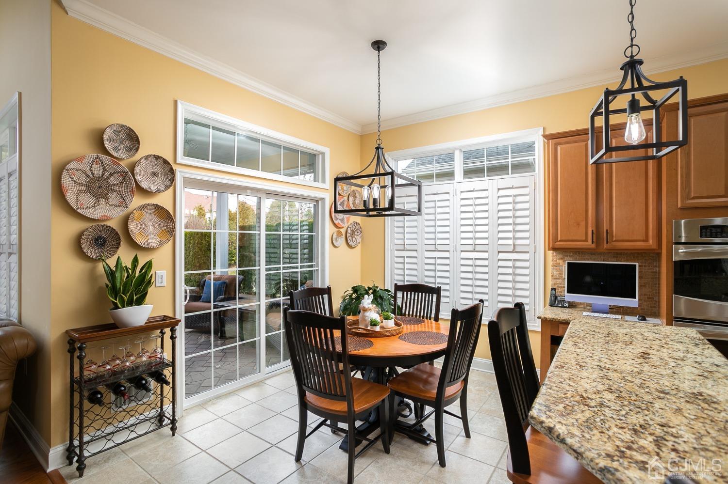 93 Timber Hill Drive Monroe Township, NJ 08831 - Photo 4 of 40 a view of a dining room with furniture window and outside view