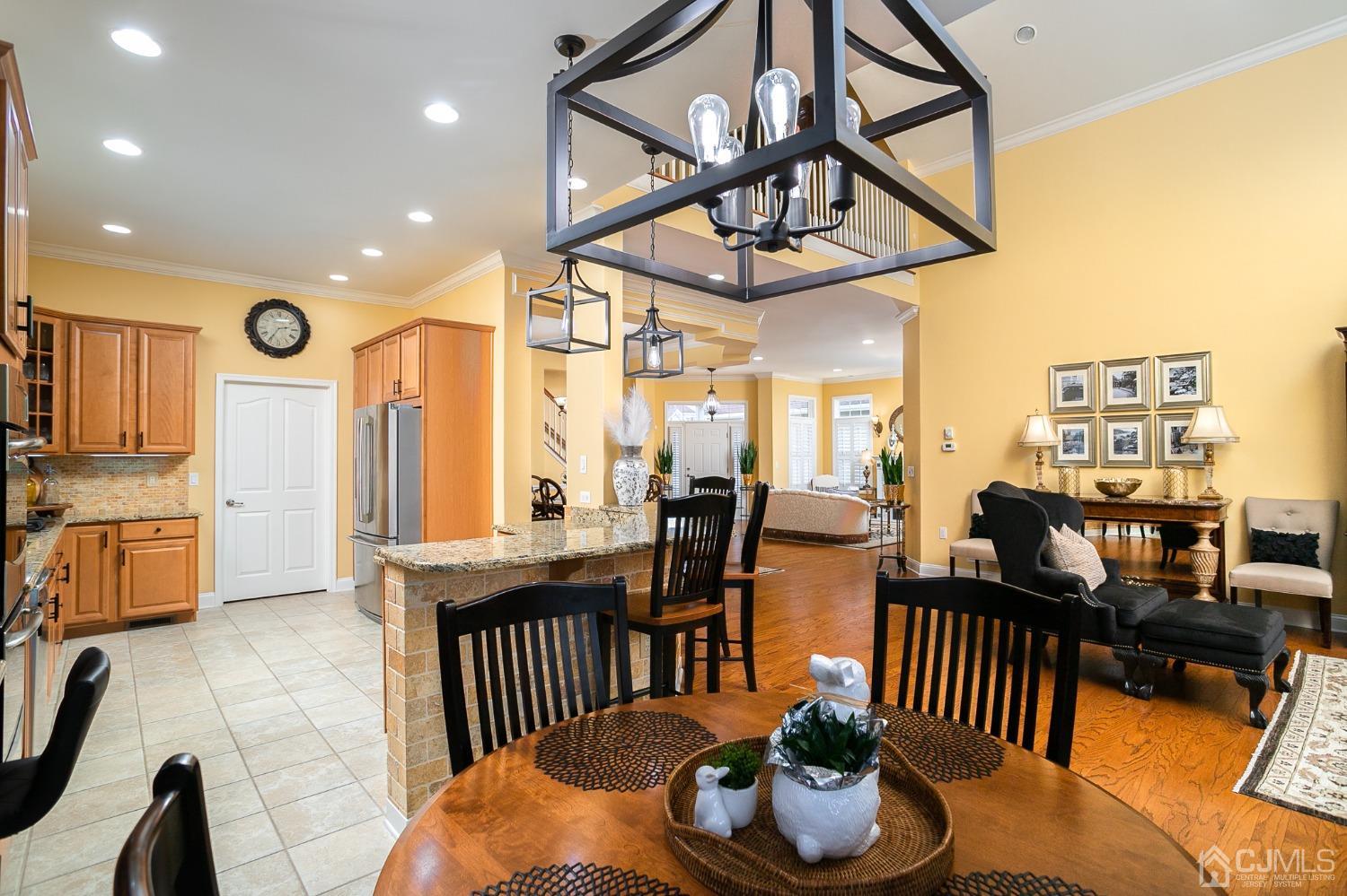 93 Timber Hill Drive Monroe Township, NJ 08831 - Photo 6 of 40 a living room with lots of furniture and a wooden floor