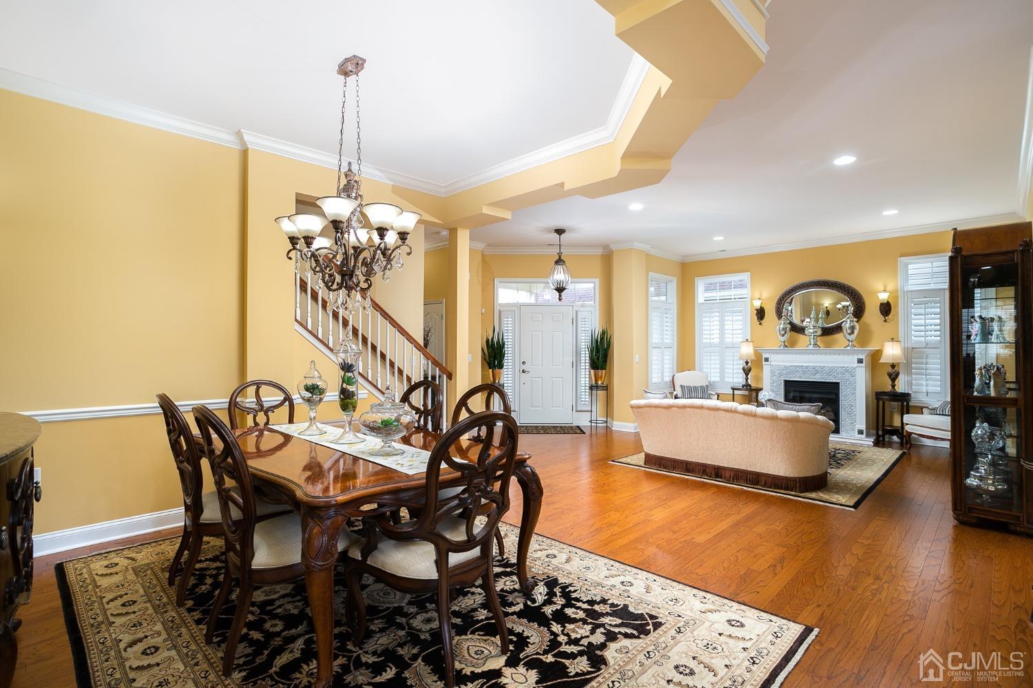 93 Timber Hill Drive Monroe Township, NJ 08831 - Photo 10 of 40 a living room with furniture and a table