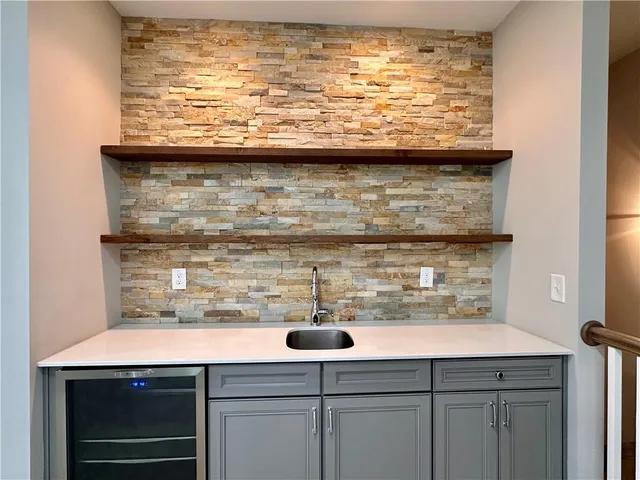 a sink with granite counter