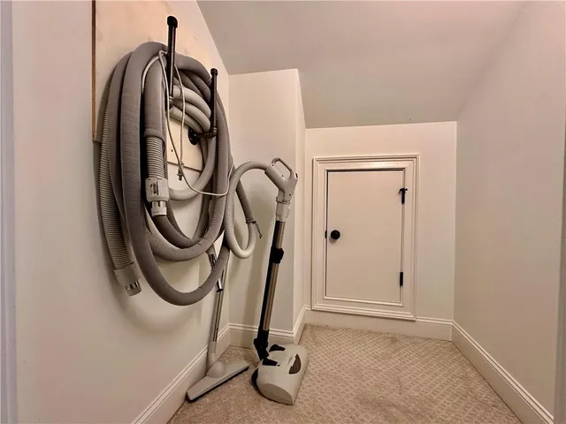 a view of a storage and utility room with a washer and dryer