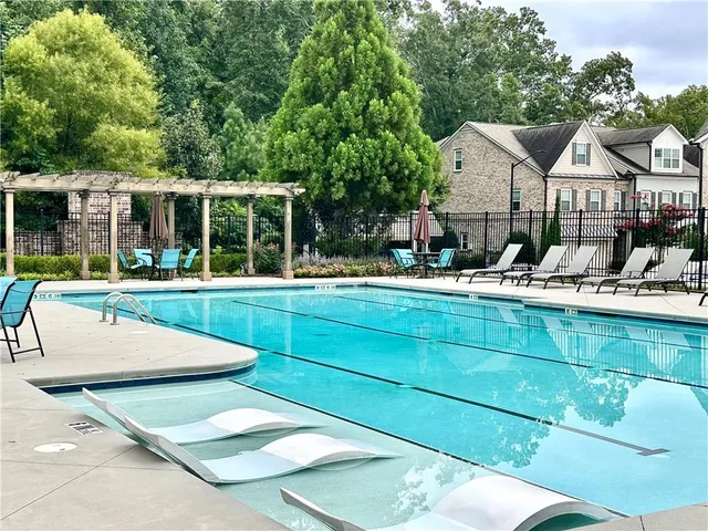 a view of a chairs and table in a patio