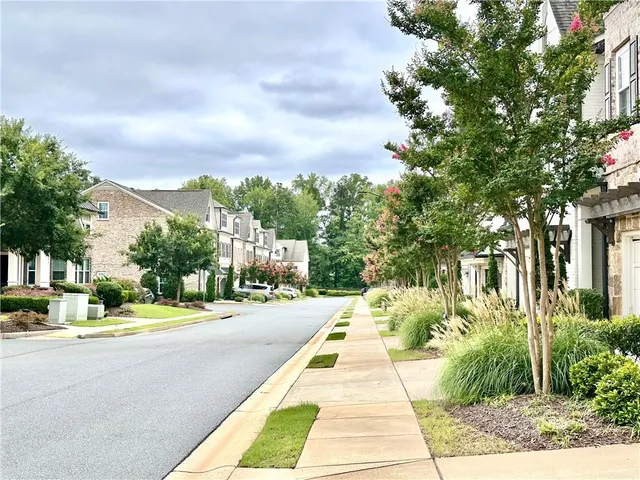 a view of a pathway with a house
