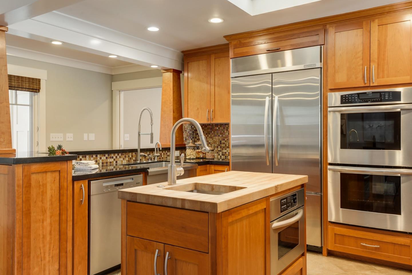 1035 Rilma Lane Los Altos, CA 94022 - Photo 12 of 41 a kitchen with a refrigerator sink and stove