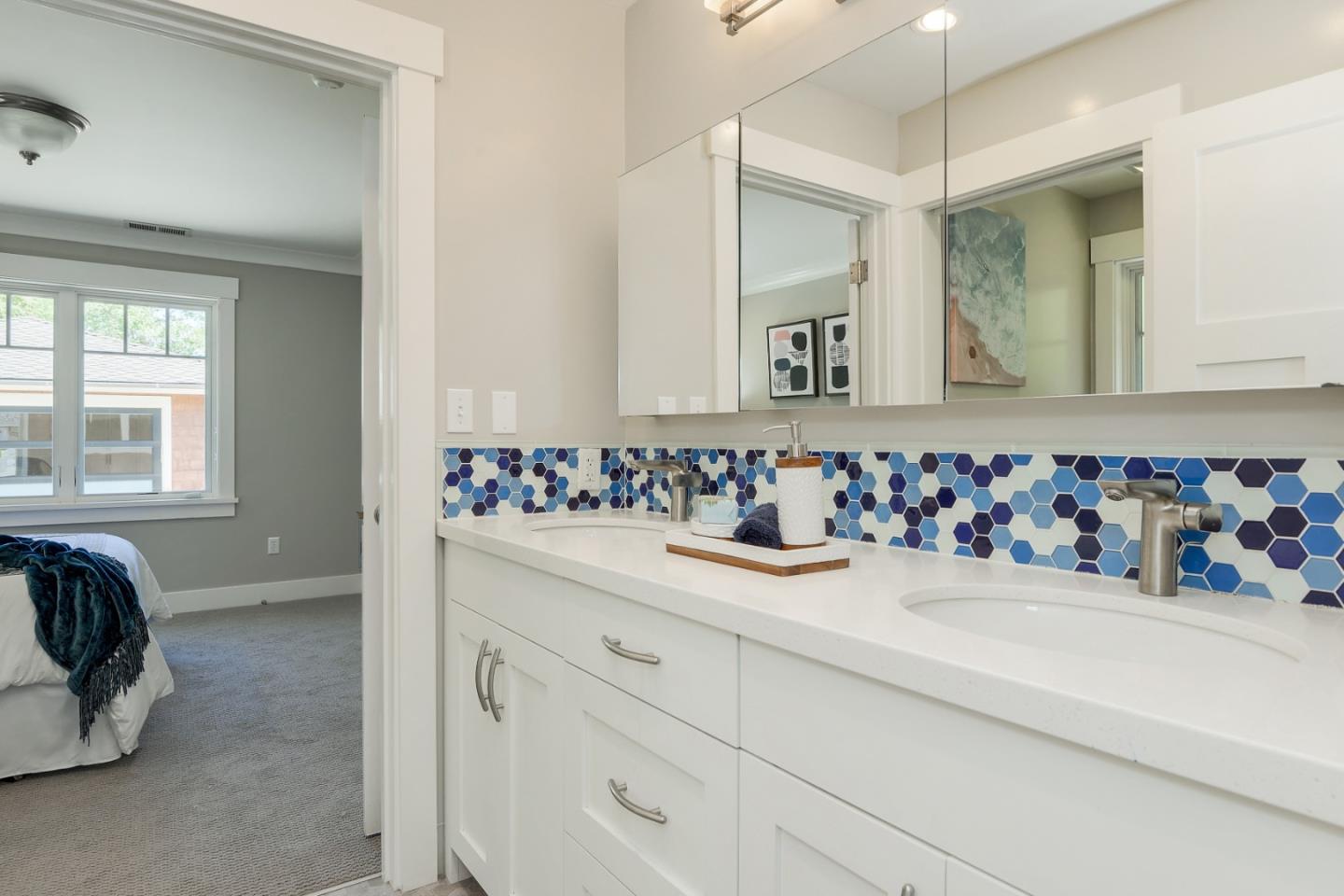 1035 Rilma Lane Los Altos, CA 94022 - Photo 19 of 41 a bathroom with a sink and a mirror