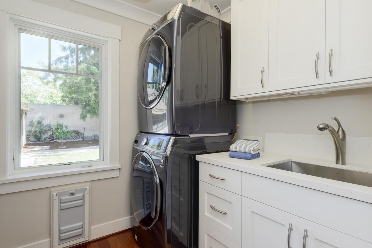 1035 Rilma Lane Los Altos, CA 94022 - Photo 23 of 41 a view of a sink and a washer dryer