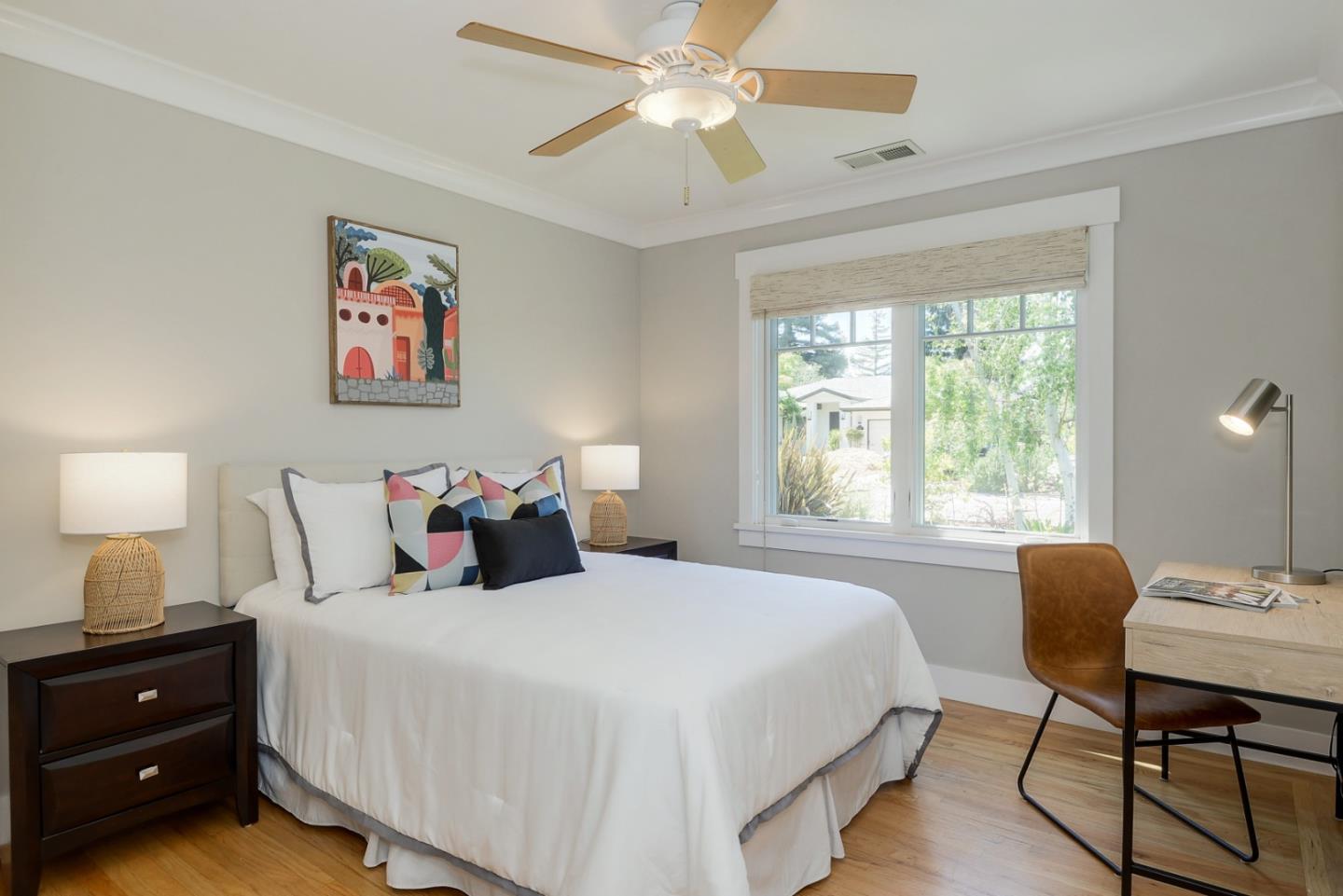 1035 Rilma Lane Los Altos, CA 94022 - Photo 25 of 41 a bedroom with bed and a window