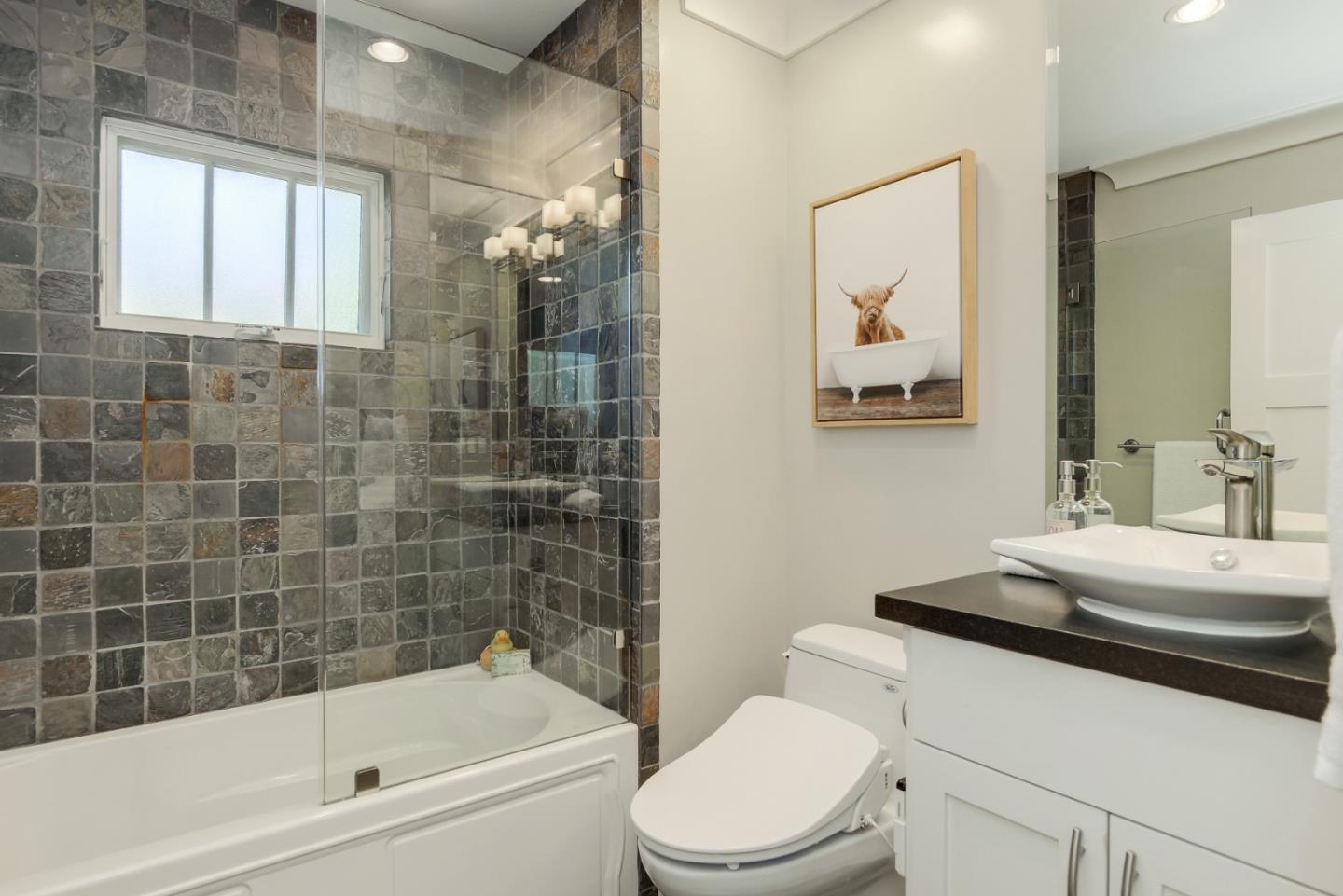 1035 Rilma Lane Los Altos, CA 94022 - Photo 26 of 41 a bathroom with a sink a toilet and shower