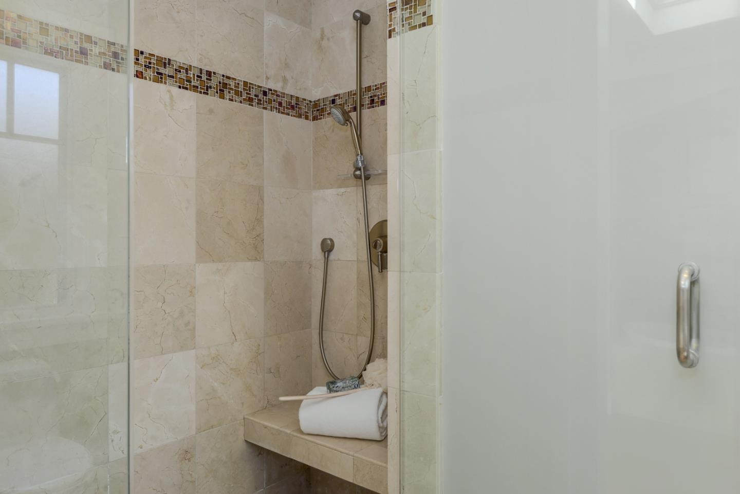 1035 Rilma Lane Los Altos, CA 94022 - Photo 28 of 41 a bathroom that has a shower and a sink