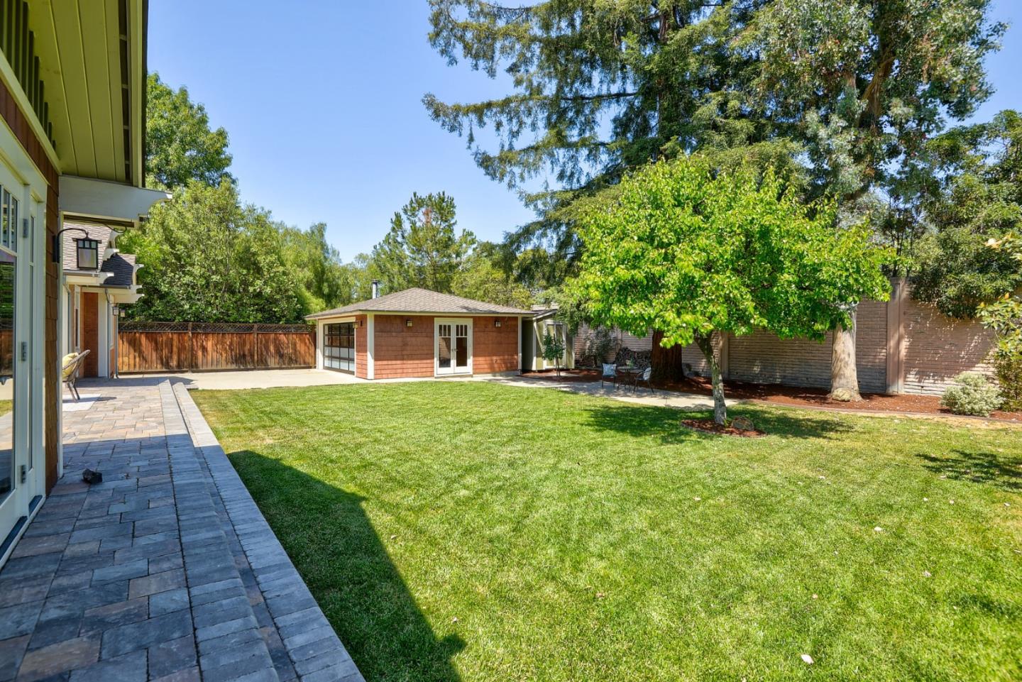 1035 Rilma Lane Los Altos, CA 94022 - Photo 38 of 41 a front view of a house with a yard
