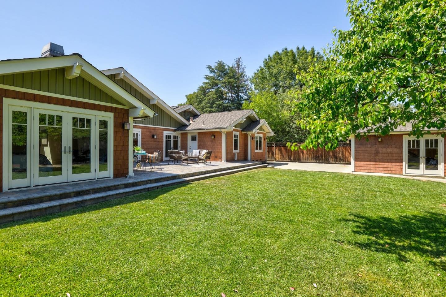 1035 Rilma Lane Los Altos, CA 94022 - Photo 39 of 41 a front view of a house with a garden