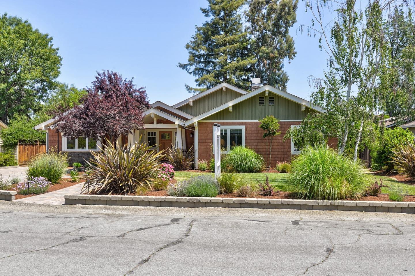 1035 Rilma Lane Los Altos, CA 94022 - Photo 40 of 41 front view of a house with a small yard