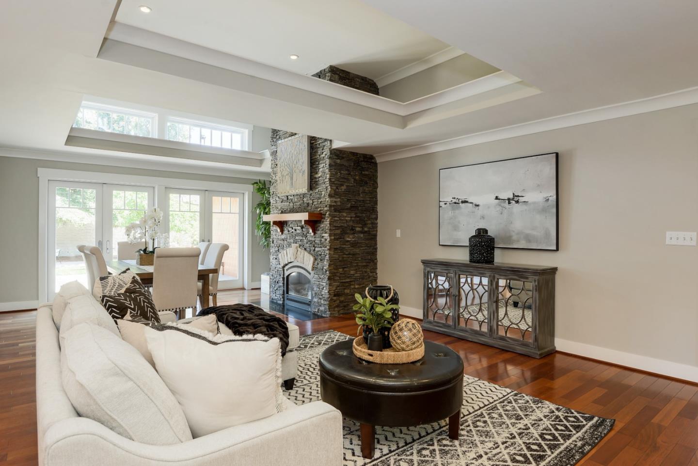 1035 Rilma Lane Los Altos, CA 94022 - Photo 5 of 41 a living room with furniture and a rug