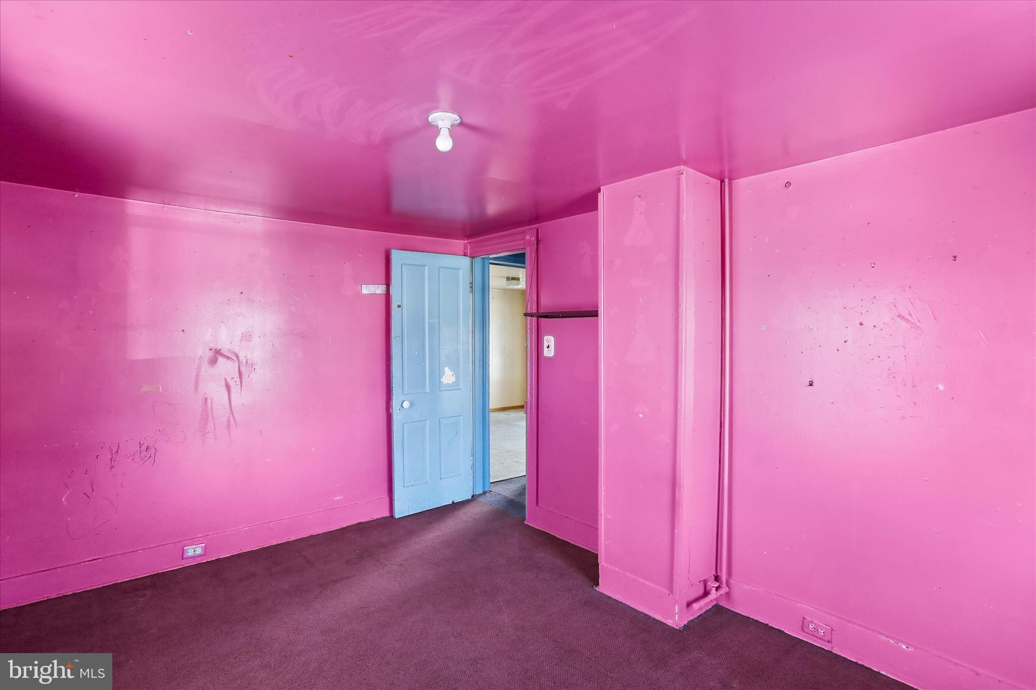 47 D Street Keyser, WV 26726 - Photo 18 of 30 a view of a livingroom with a red painted walls
