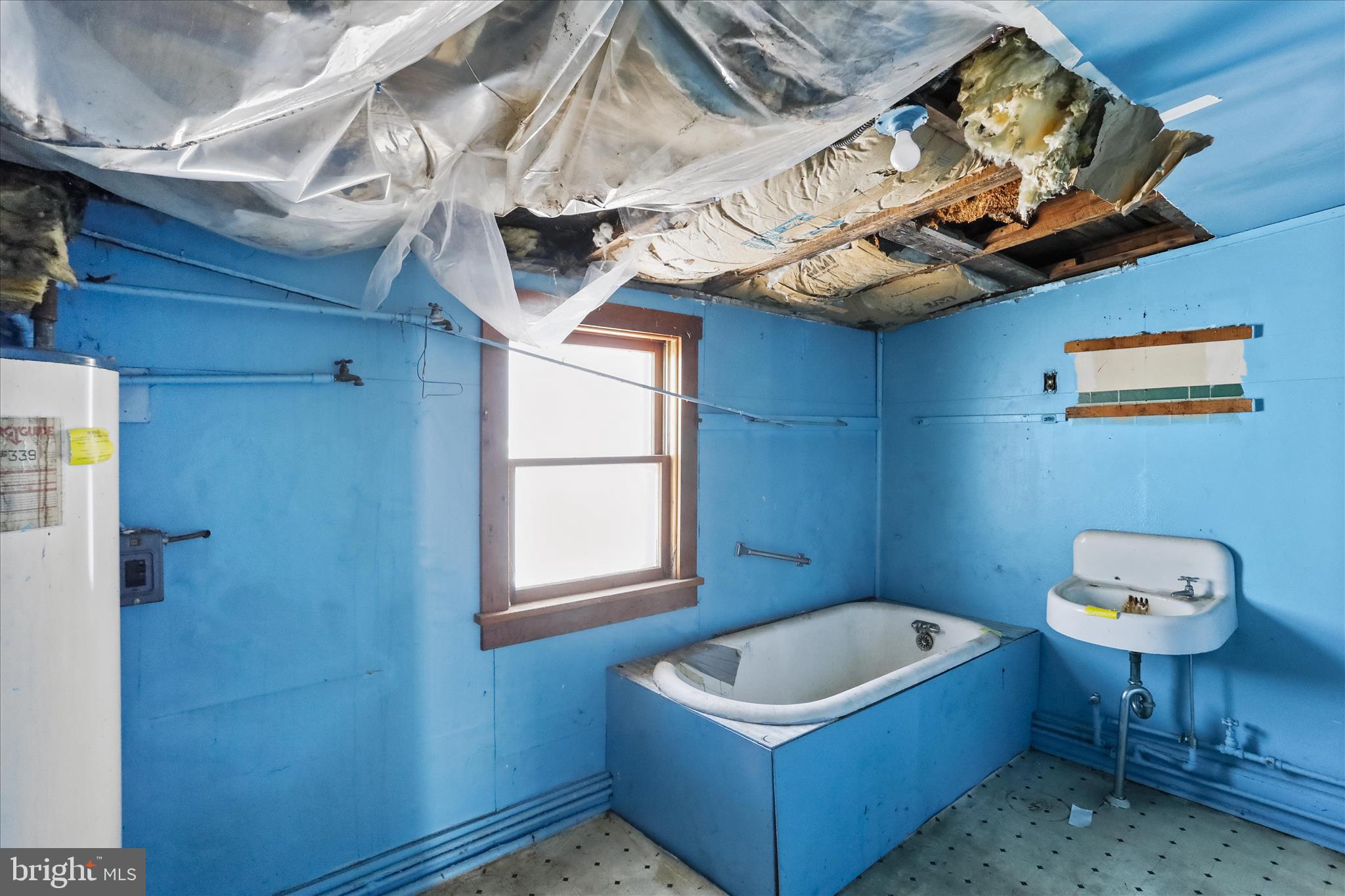 47 D Street Keyser, WV 26726 - Photo 23 of 30 a view of a bathroom with a sink and a window