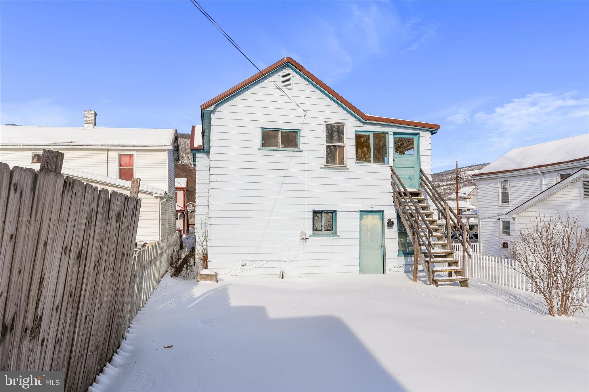 47 D Street Keyser, WV 26726 - Photo 29 of 30 a view of a house with a wooden fence