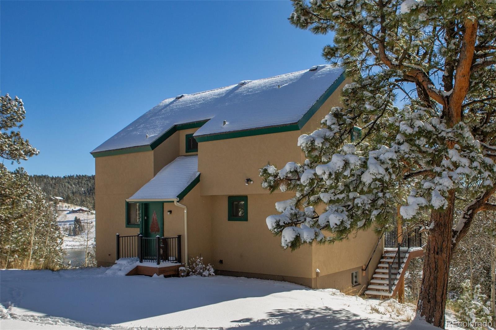 170 Ridge Road Divide, CO 80814 - Photo 1 of 50 a view of a house with a yard